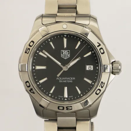 Herrur Tag Heuer Aquaracer, stål, quartz, 39mm, refnr WAP1110, serienr RUX1431, datum, stållänk ca 18cm, repig, extra länkbitar, certifikat Krons Ur PK-Huset daterat 20140829, box, ytterkartong. 