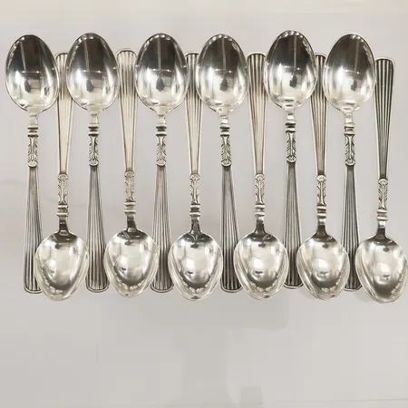 Tolv moccaskedar, ca 11,4cm, Markströms Guldsmeds Ab K G Uppsala år 1961, 830/1000 silver Vikt: 159,6 g