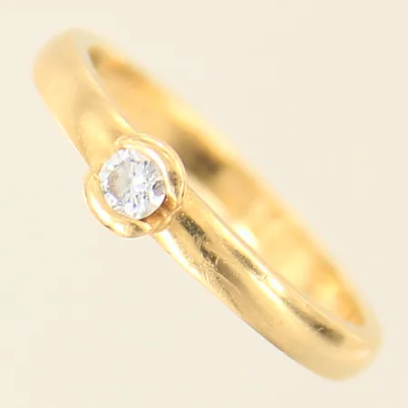 Ring med diamant 0,10ct enligt gravyr, stl 16½, bredd 2,5-4mm, Heribert Engelbert AB, 18K  Vikt: 3 g