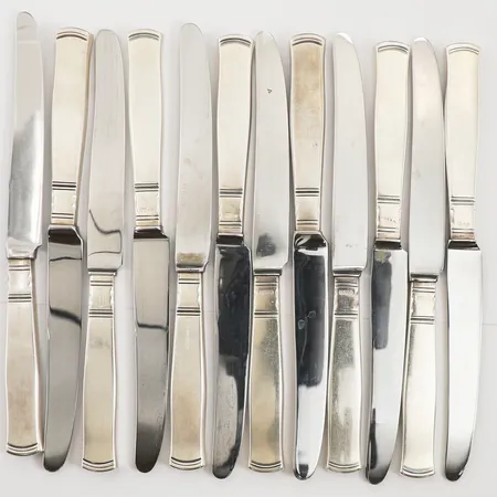 Tolv knivar modell Rosenholm, längd 19,5cm, blad i rostfritt stål, GAB, repiga, 830/1000 silver Bruttovikt 735,1g Vikt: 735,1 g