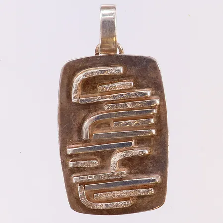 Hänge, Claës E. Giertta, tillverkad år 1967, 60mm med ögla, bredd 33mm, silver Vikt: 24 g