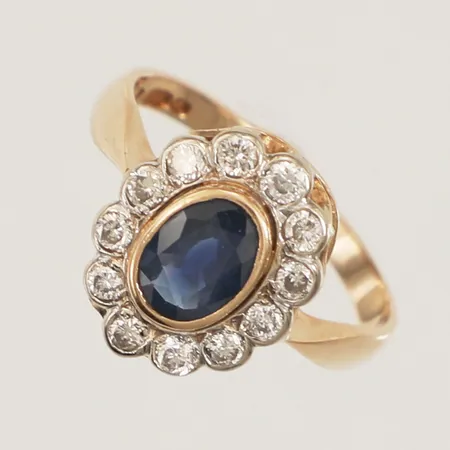 Carmoséring med diamanter 12x ca 0,02-0,03ct, samt blå sten, möjligen safir, stl  17¼, bredd 13,6mm, Finland år 1993, 14K Vikt: 3,2 g