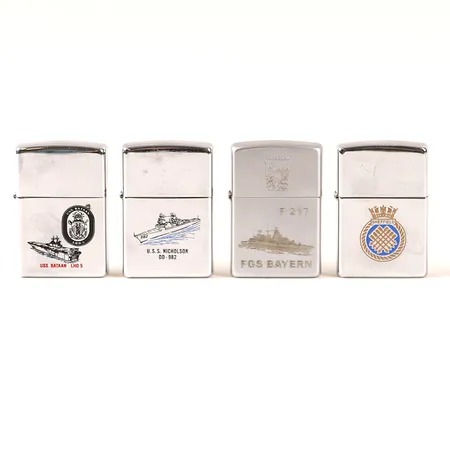 Fyra Zippotändare med militära motiv, höjd 5,5cm, slitage, ej funktionstestade, FGS Bayern saknatrtändstift. 