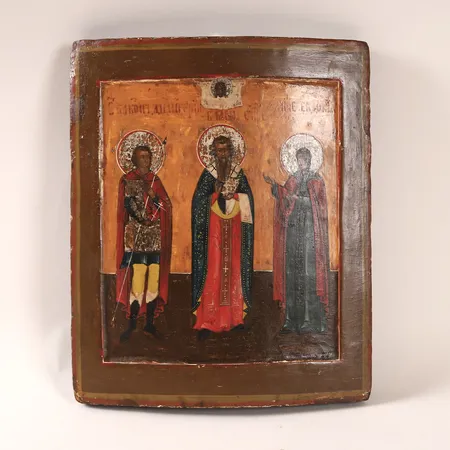 Ikon, Ryssland, tempera på pannå, föreställande Alexander Nevskij, Nikolaus undergöraren och Maria Magdalena, 30x25cm, 1800-tal, renoverad, sedvanligt slitage, delar av pannå saknas vid baksidan. Skickas med postpaket.