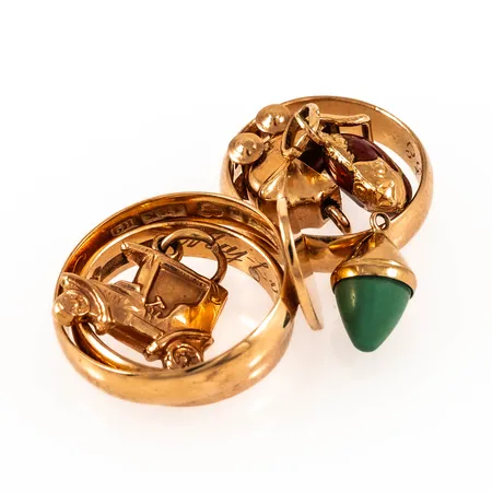 Diverse defekt/graverat guld i 18K. Vikt: 16,6g. 