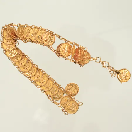 Armband med myntdetaljer, längd ca 14,5cm, bredd 14mm, trasigt på flera ställen, 21K, 9,6g Vikt: 9,6 g