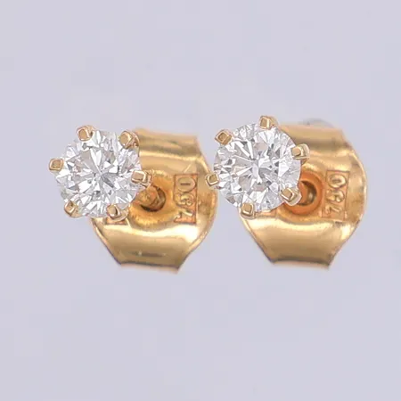 Ett par örhängen med diamanter 2 x ca0,14ct W(H)Si, 18K Vikt: 0,7 g