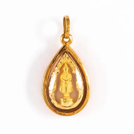 Hänge Buddha med folierad ram i 18K guld. Det är 10,5 mm brett, 22 mm långt inkl. ögla och väger 1,0g. 