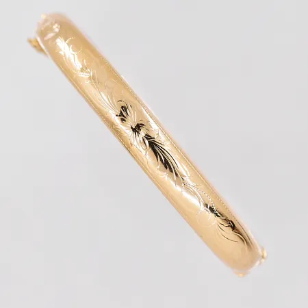 Armring mönstrad, Ø63,4mm, bredd 9mm, ihålig, bucklig, 14K Vikt: 12,5 g