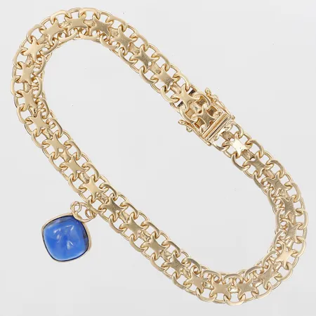 Armband X-länk samt berlock med blå sten, längd 19cm, bredd 8mm, 18K guld, bruttovikt 17,7g Vikt: 17,7 g