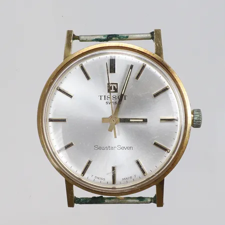 Herrur Tissot Seastar Seven 18K Ø33,5mm manuell uppdragning, obs defekt krona, går ej att ställa tiden, gravyr "Nit och Redlighet", monocoque-boett, slitage, utan länk bruttovikt 26,1g