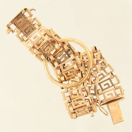 Guldsmycken, gravyr, skadad länk, saknar säkerhetskedja, 18K  Vikt: 19,7 g