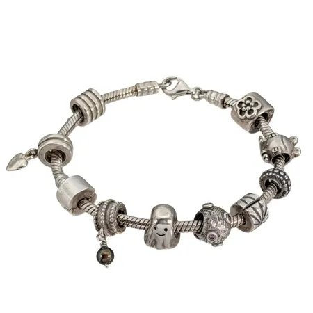 Armband PANDORA, silver 925/1000, ALE, 10 stycken berlocker/charms (någon enstaka med svag/fragmentarisk märkning), en med rosa stenar, längd 19 cm, länk Ø3 mm, berlocker med varierande mått Vikt: 39,4 g