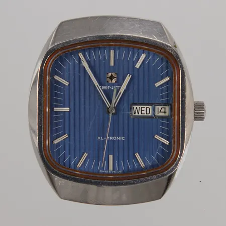 Herrur Zenith XL-Tronic, 37,5x43 mm, boettnr: 01-0010-505, stål, kvarts, stämgaffelur, mineralglas, dag, datum, utan läderband, repor på glas, skruv till bakboett saknas, inga tillbehör.