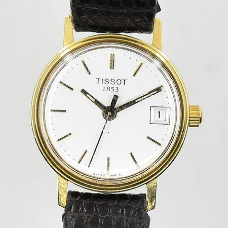 Damur Tissot 18K quartz Ø22mm datum, graverad bakboett, behov av batteribyte, slitet läderband.