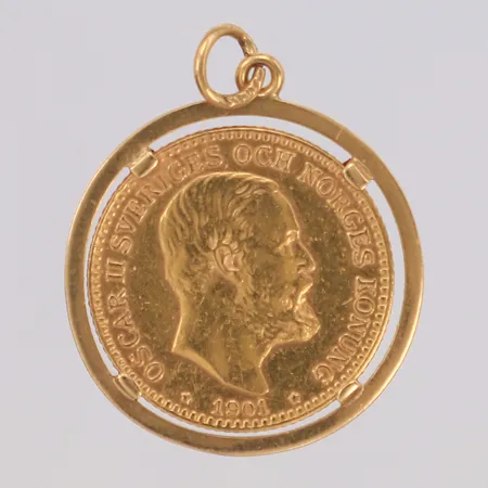 Mynt Oscar II Sveriges och Norges konung 10 Kronor, Ø18mm, ram i 18K, 21,6K Bruttovikt 5,4g Vikt: 5,4 g