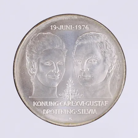 Jubileumsmynt Kungabröllopet 19 juni 1976 Konung Carl XVI Gustav och Drottning Silvia, Ø36mm, nominellt värde 50kr, silver 925/1000 Vikt: 27 g