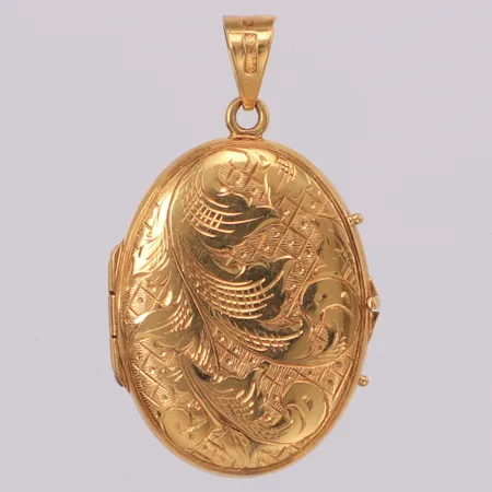 Hänge medaljong, längd 32mm, bredd 19,5mm, Guldvaruaktiebolaget G. Dahlgren & Co Ab Malmö 1959, 18K Vikt: 3,8 g