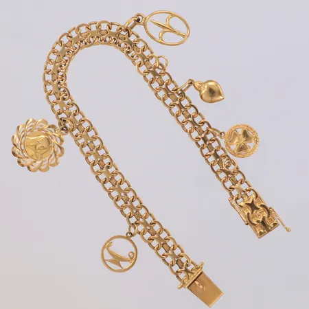 Armband X-länk med fem berlocker, längd 19,5cm, bredd 7,9mm, berlocker saknas, 18K Vikt: 20,7 g