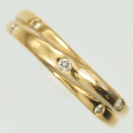 Ring med dia 5 x ca 0,01ct stl 18, bredd ca 2-5mm, 18K, 3g