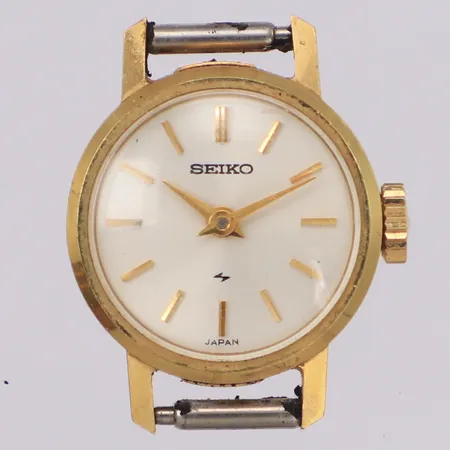 Damur Seiko 14K, manuell, 17,4mm, boettnr 820265 100870, bruttovikt 6,3g, armband saknas, repigt plexiglas, inga tillbehör.