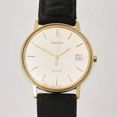 Herrur Tissot Seastar i 18K guld Ø33,5mm, quartz, datum, gravyr: för nit och redighet i rikets tjänst, läderband repor på glas samt bakboett, i behov av batteribyte.