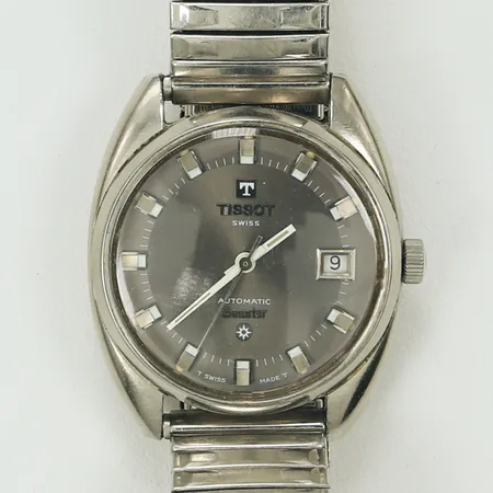 Herrur Tissot Seastar automatisk stål Ø ca 37mm, plastglas, datum, flexlänk i metall, repigt glas