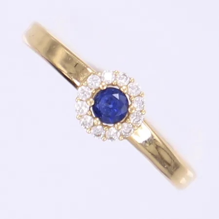 Ring med blå samt vita stenar stl: 17 bredd 2-5mm 18K Vikt: 0,5 g