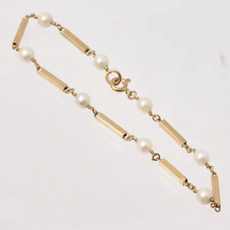Armband 19,5cm stav med 8st odlade pärlor bredd 1,9-4,8mm, 18K, 4,16g.