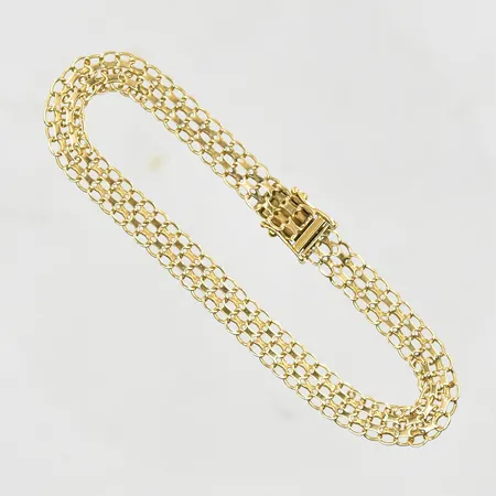 Armband X-länk längd 20 cm, bredd 7 mm, 18K. Vikt: 8,9 g