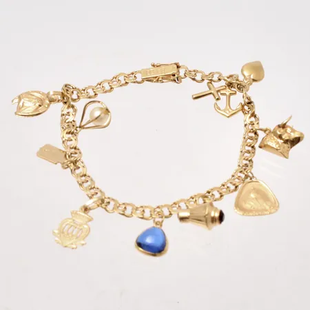 Armband 18,5cm Bismarck bredd 4,8mm, 9st berlocker, 18K, 16,51g.