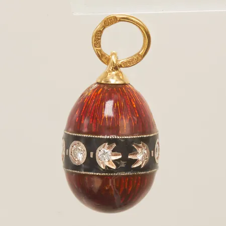 Smyckesägg W.A. Bolin med diamanter 3 x ca 0,04ct + 6 x ca 0,01ct längd inkl ögla ca 2cm, bredd 1-11,5mm, silverkula med röd samt svart emalj, skador på emalj, ögla i 18K, bruttovikt 4,7g, Nypris ca 15 000kr