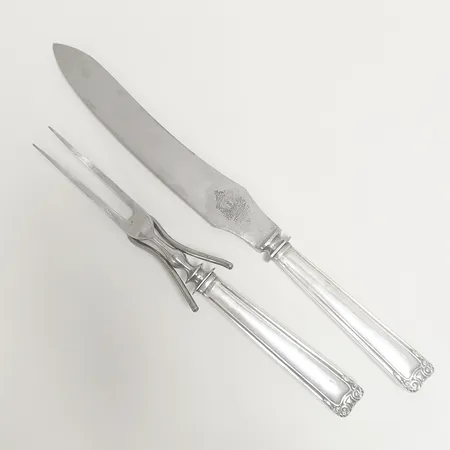 Skinnbestick två delar Eskilstuna Jern, blad i stål, monogram, silver 830/1000, bruttovikt 320,3g Vikt: 320,3 g