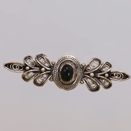 Brosch med svart sten, limrester, längd 52mm, 925/1000 silver Vikt: 8 g