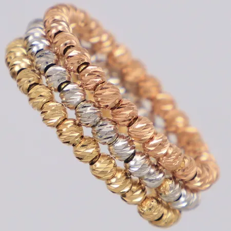 Ring trefärgad stl:17½, bredd 7,3mm, öppen skena, ostämplad, 18K Vikt: 5,4 g