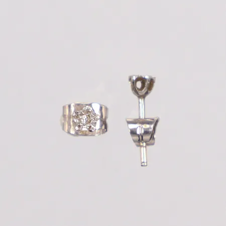 Ett par örhängen vitguld Ø3,4mm diamanter 2x ca. 0,001ct, 14K Vikt: 0,7 g