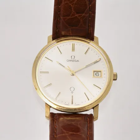 Armbandsur Omega i 14K guld, manuell, Ø34mm, datum, läderband, personlig gravyr, bruksskick, box.
