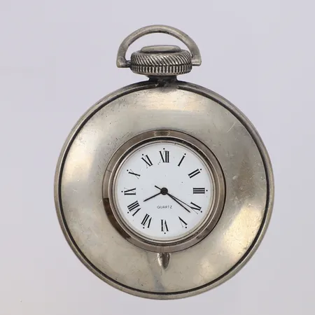 Klocka/Fickur, quartz, går ej, tennhölje märkt Taglione, längd 83mm, repor, damm i urtavla