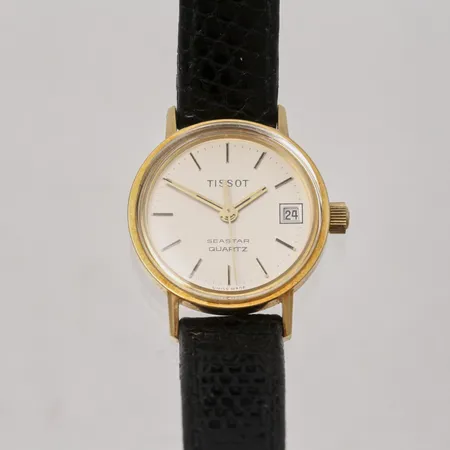 Damur Tissot Seastar quartz 18K guld, Ø22mm, datum läderband, i behov av batterinyte, ej graverad.