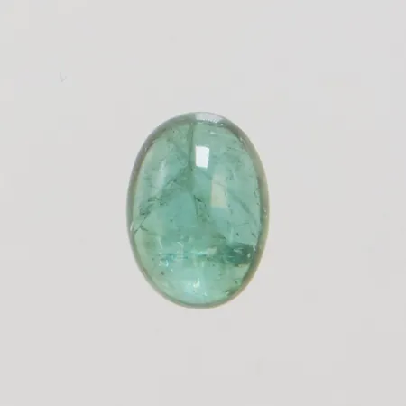 Cabochonslipad grön turmalin ca 14,2x10,4mm, ca 7,5ct, ytliga inneslutningar, vikt 1,5g