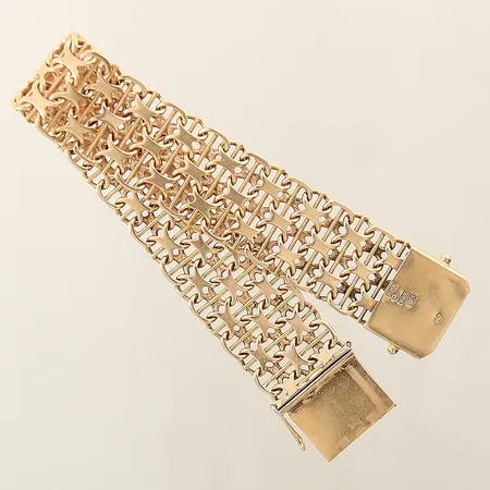 Armband X-länk med stav längd 19,5cm, bredd 19,8mm, en låsåtta saknas 18K Vikt: 49,3 g