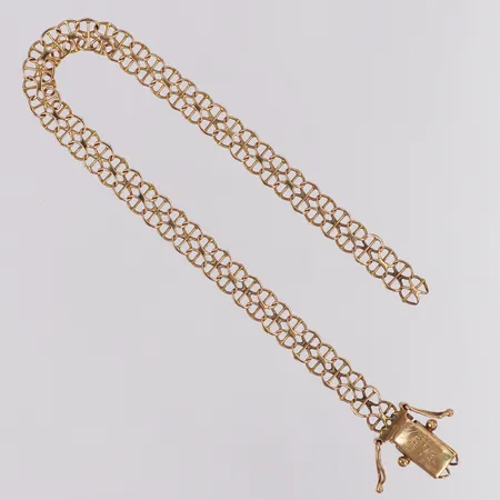 Armband X-länk med stav längd ca 19cm bredd 5,7mm, defekt, 18K Vikt: 6,2 g