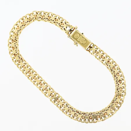 Armband X-länk utan stav, längd 19cm, bredd 6mm, mindre skevheter, gravyr under låstunga, 1 låsåtta saknas, 18K  Vikt: 10,2 g