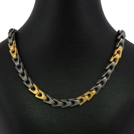 Collier i silver 925/1000, Design aha, modell med förgyllda och oxiderade länkbitar, längd 43,5 cm, bredd 8 mm, tjocklek 6 mm, fint skick Vikt: 55,5 g