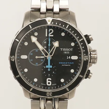 Herrur Tissot Seastar stål automatisk, Ø 48mm, datum kronograf heliumventil safirglas, glasbaksida, refnummer: T066427A, serienummer: 11BC1335675, färgbortfall på bezel, stållänk längd 19,5cm inkl ur, extra länkbit manual samt bok "the story of watch company" box,