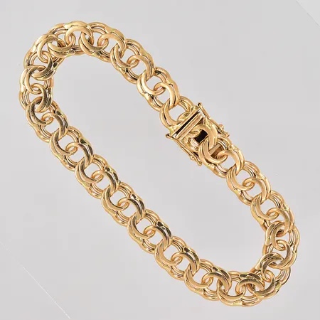 Armband Bismarck längd 20cm bredd 9mm GHA 18K Vikt: 29,2 g