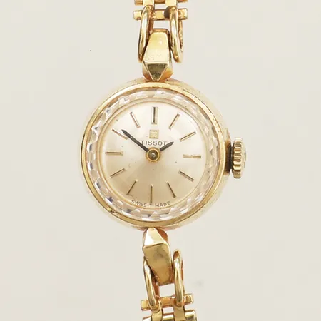 Damur Tissot 18K Ø17mm, korridorlänk i 18K längd 16cm inkl ur, gravyr, bruttovikt: 18,7, går ej inga tillbehör Vikt: 18,7 g