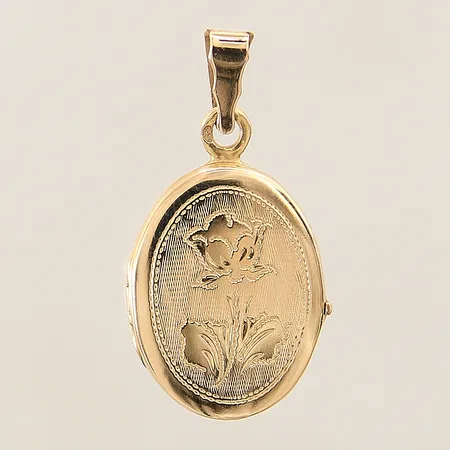 Medaljong med dekor ca 30,6 x 16,2mm 18K Vikt: 3,5 g