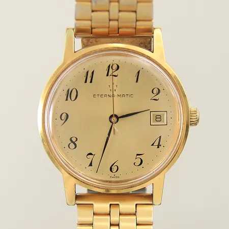 Herrur Eterna-Matic guld/stål automat Ø35mm numrerad 633.2062.23 datum länk i stål/doublé ej original plexiglas samt boett med repor inga tillbehör