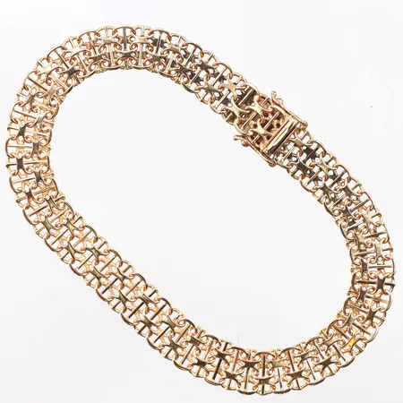 Armband x-länk med stav, längd 21cm, bredd 9,5mm, 18K. Vikt: 14,2 g
